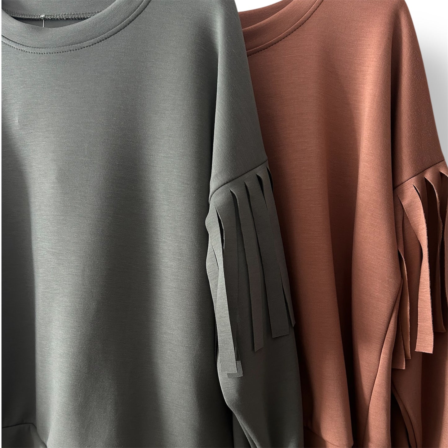 Sudadera flecos